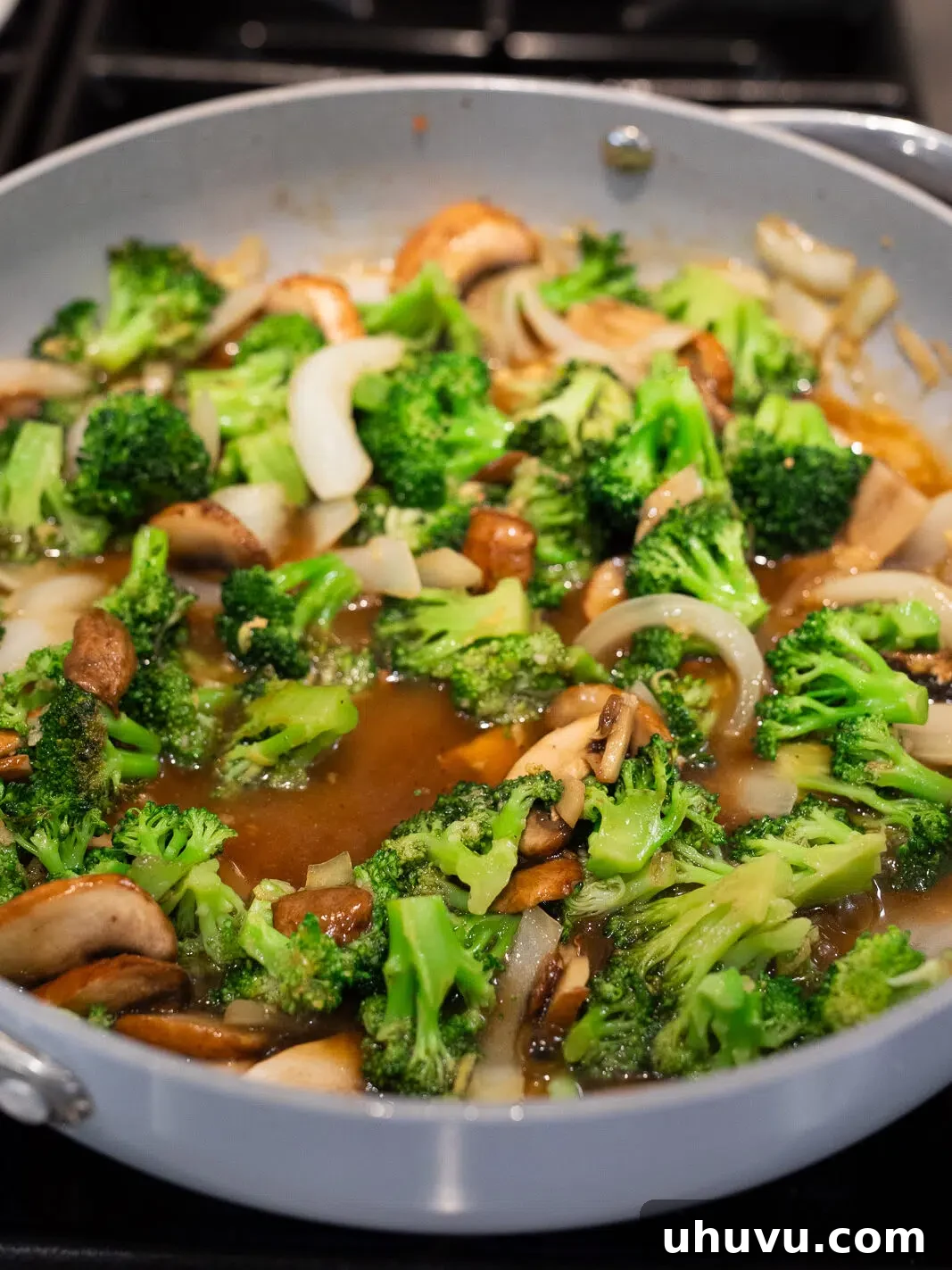 stir frying vegetables with sauce