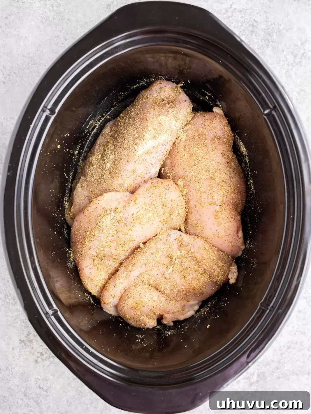 Authentic Mississippi Slow Cooker Chicken 5 seasoned chicken in slow cooker