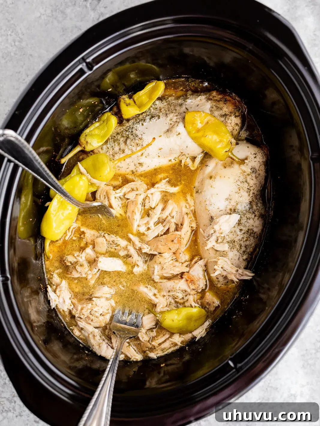 Authentic Mississippi Slow Cooker Chicken 8 shredding Mississippi chicken in the crock pot