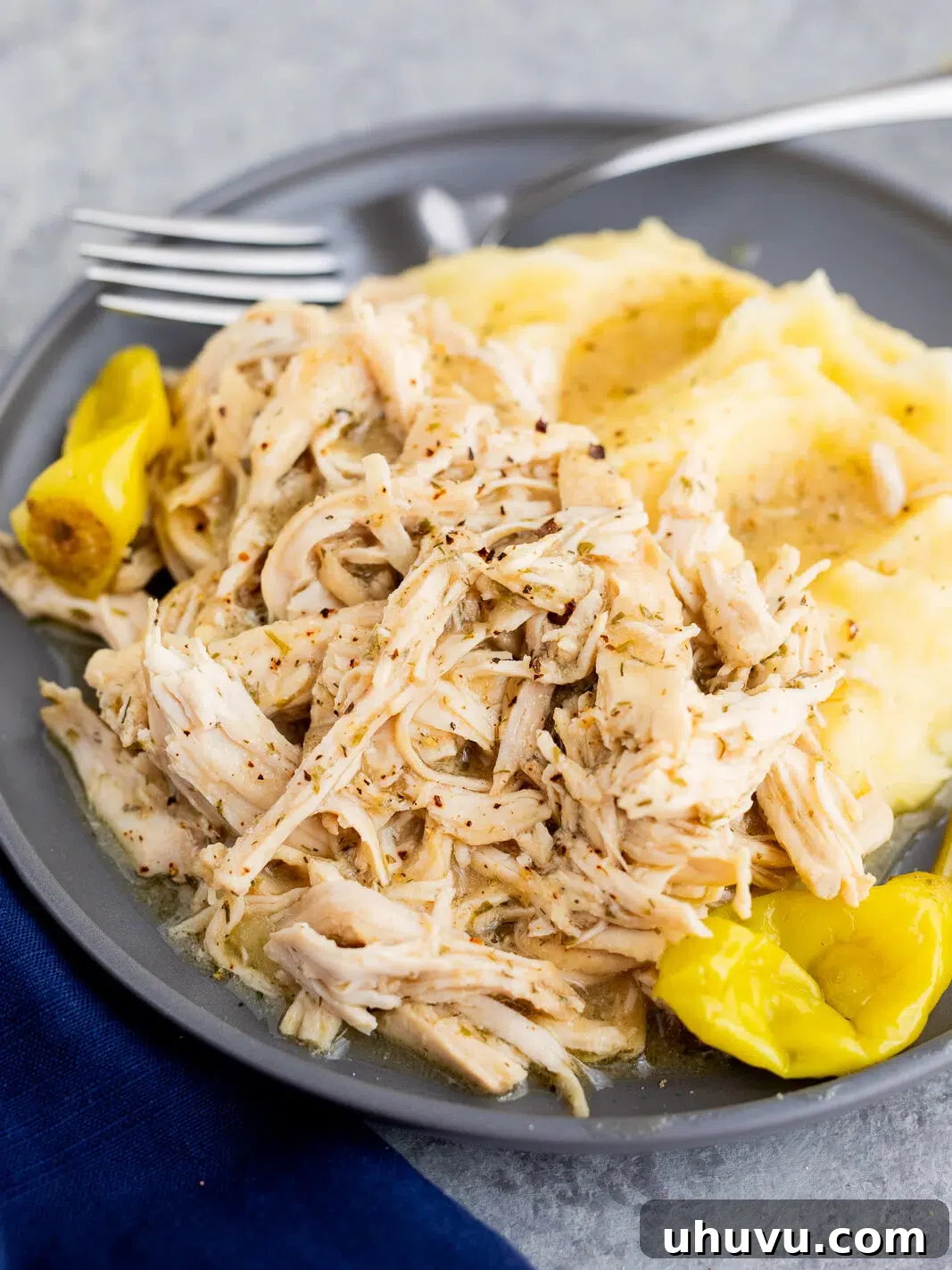 Authentic Mississippi Slow Cooker Chicken 9 Mississippi chicken served over mashed potatoes