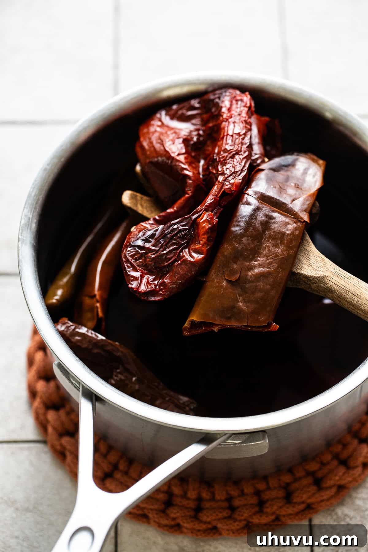 Homestyle Enchilada Red 4 Rehydrating the dried chiles by soaking them in a pot of water