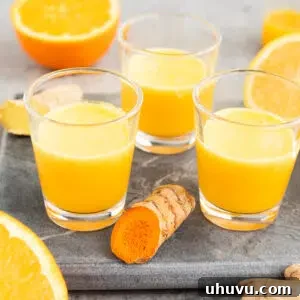 Ginger Turmeric Citrus Juice Shots in glass shots