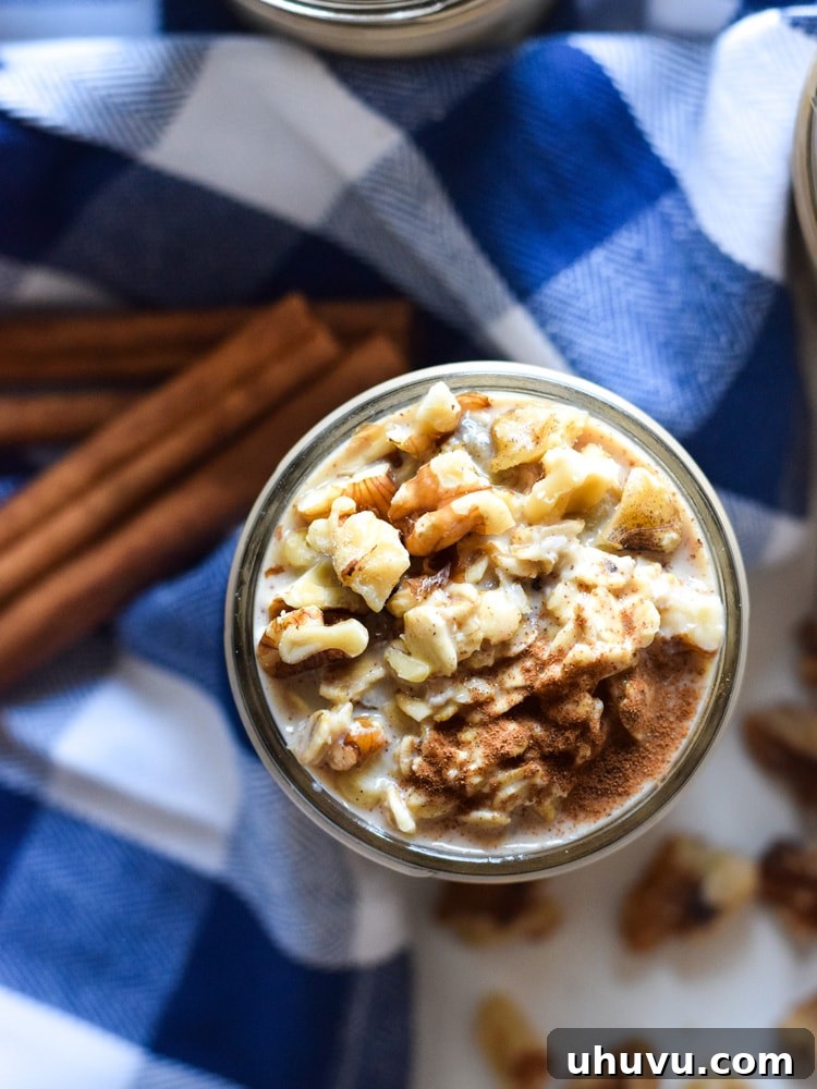 Triple Milk Overnight Oat Bliss 6 A mason jar of Tres Leches Overnight Oats with a spoon, ready to eat
