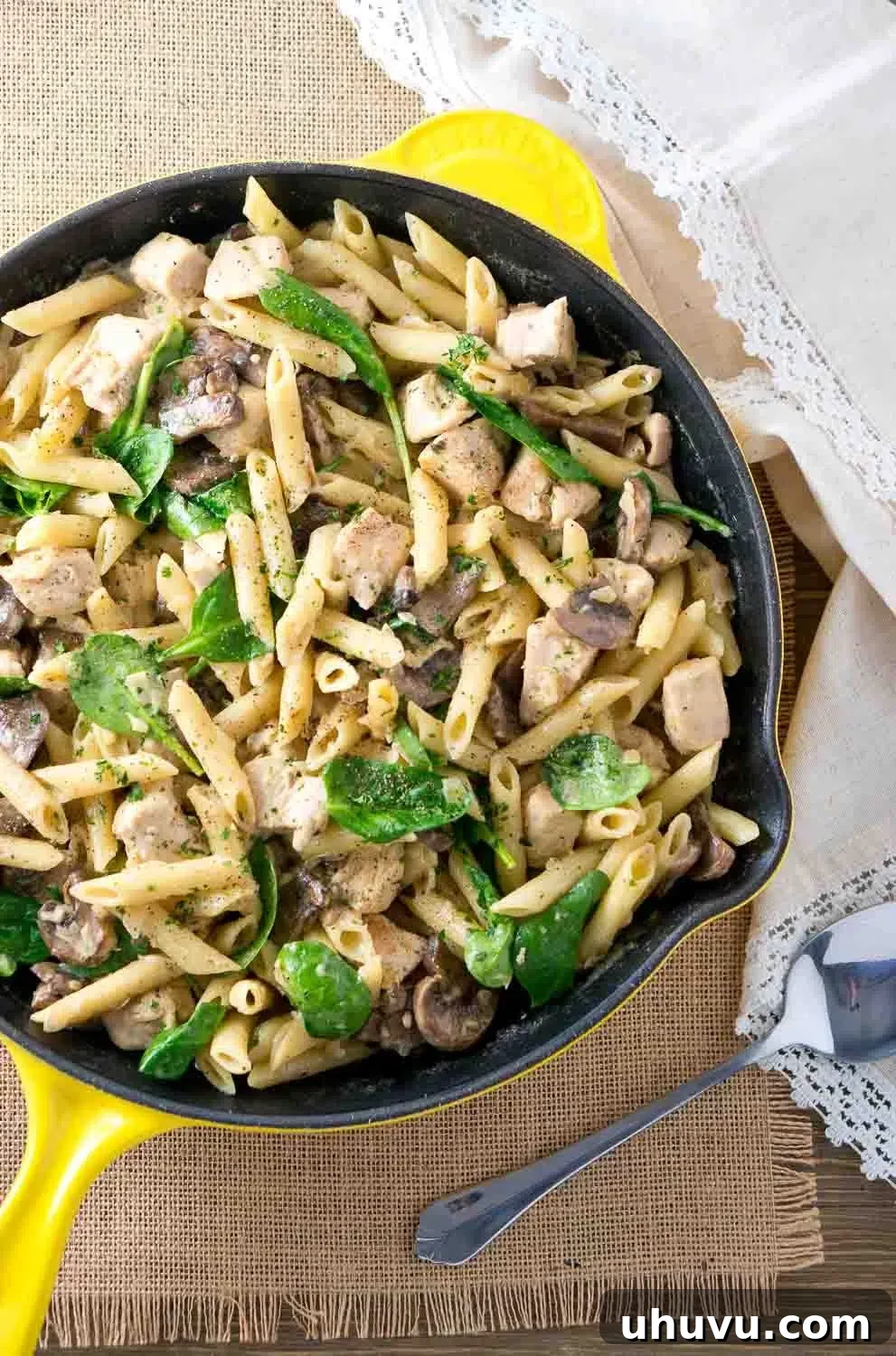 Savory Chicken Penne with Creamy Mushroom White Wine Sauce 2 One-Pan Chicken Penne with Creamy Mushroom White Wine Sauce, garnished and ready to serve