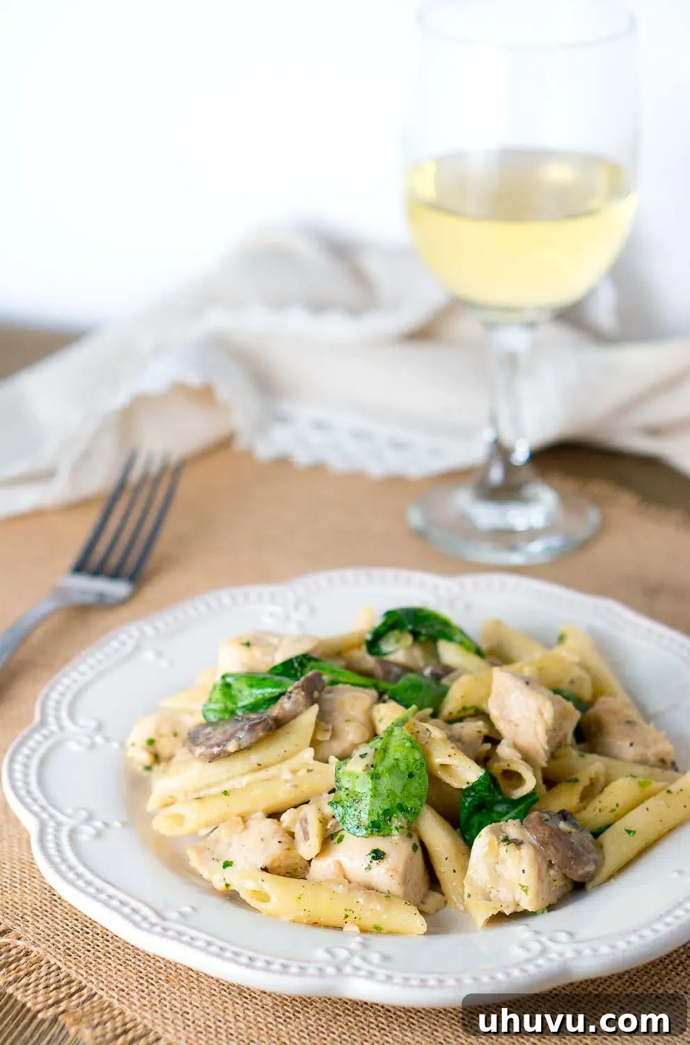 Savory Chicken Penne with Creamy Mushroom White Wine Sauce 3 Overhead shot of Chicken Penne with Creamy Mushroom White Wine Sauce in a skillet