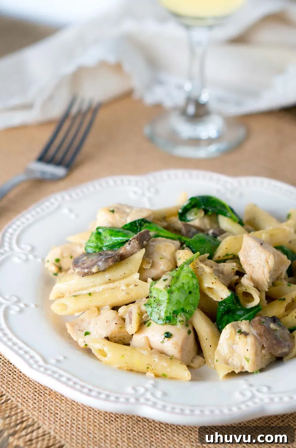 A delicious bowl of One-Pan Chicken Penne with Creamy Mushroom White Wine Sauce