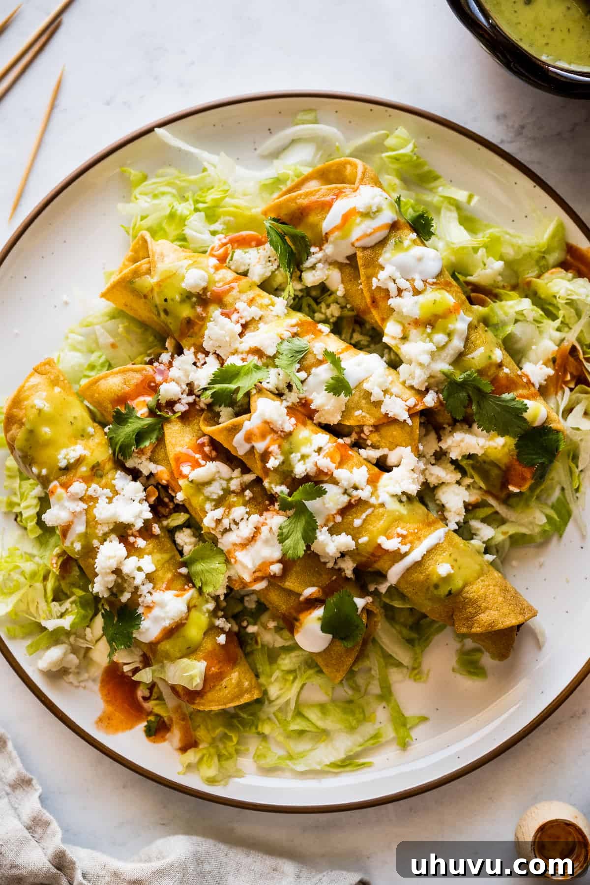 April's Culinary Crucible 2023 2 Delicious homemade Flautas for the Isabel Eats cooking challenge.