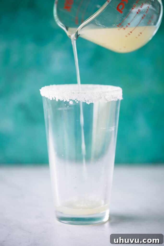 Zesty Brew Creation 4 Lime juice being poured in a pint glass