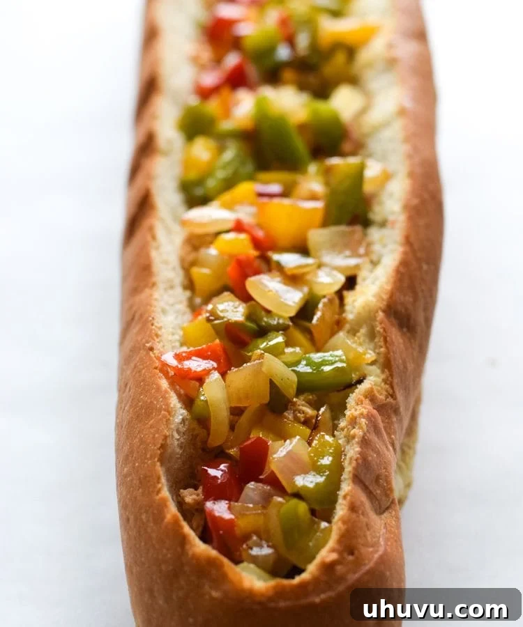 The hollowed-out French bread loaf, ready to be filled with the delicious chicken fajita mixture.