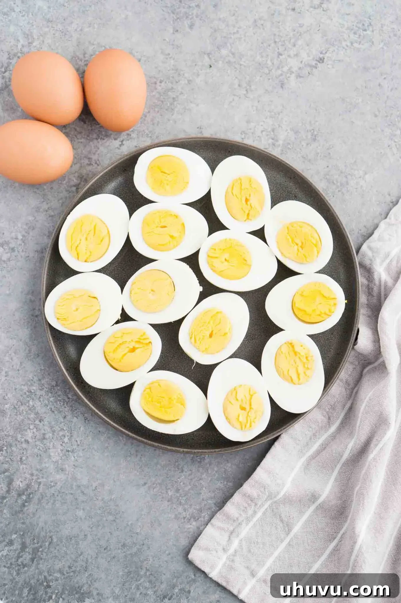 Foolproof Instant Pot Hard Boiled Eggs 7 instant pot hard boiled eggs on a plate