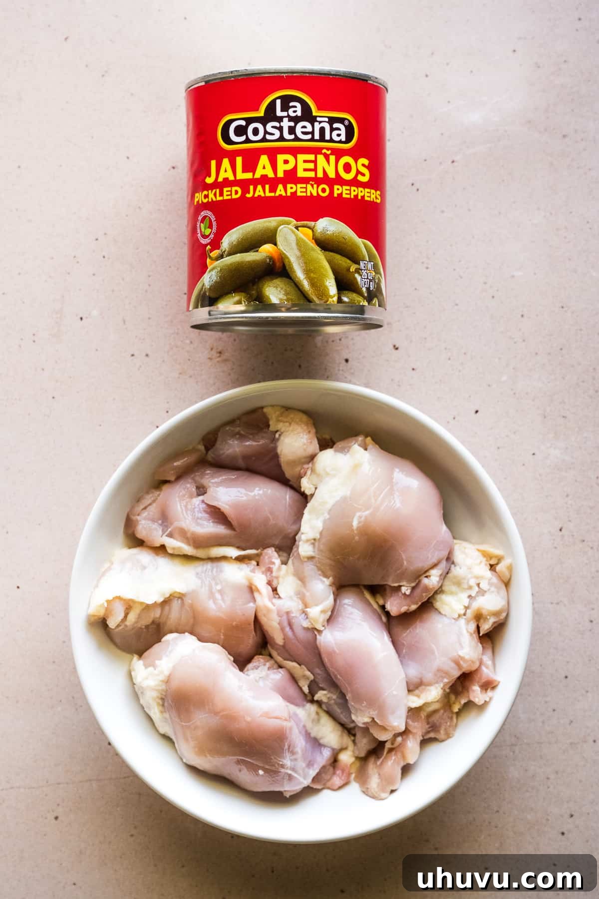 Your Secret to Perfectly Flavorful Chicken 3 Two key ingredients for the best chicken marinade: pickled jalapeños and raw chicken cuts.