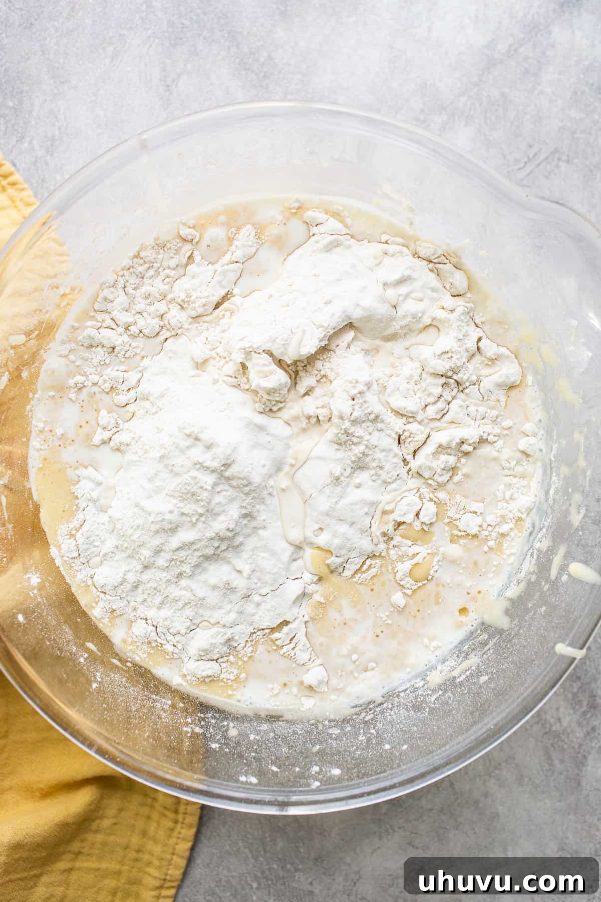 Mexico's Iconic Pink Cortadillo 4 Cortadillo cake batter in a large bowl being mixed to a smooth consistency.