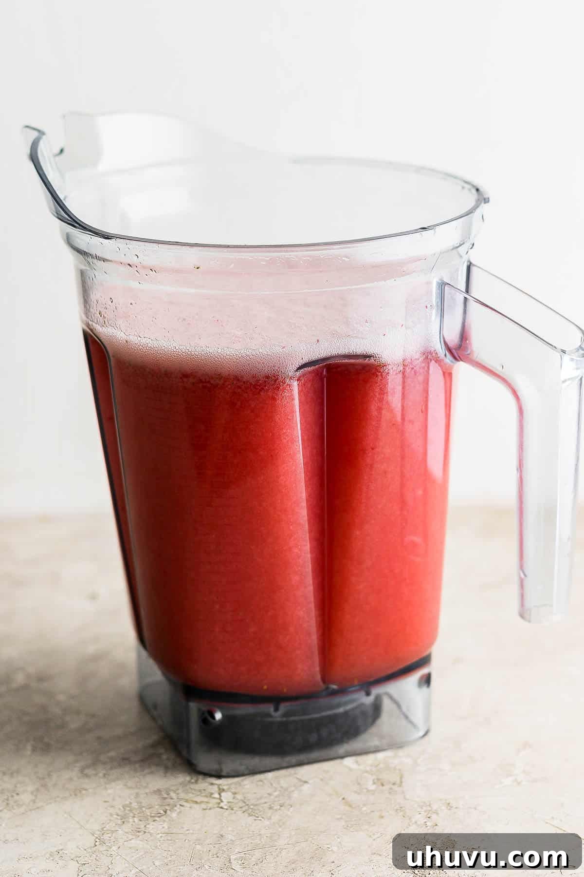 Refreshing Strawberry Sip 5 Blended agua de fresa (strawberry agua fresca) in a blender.