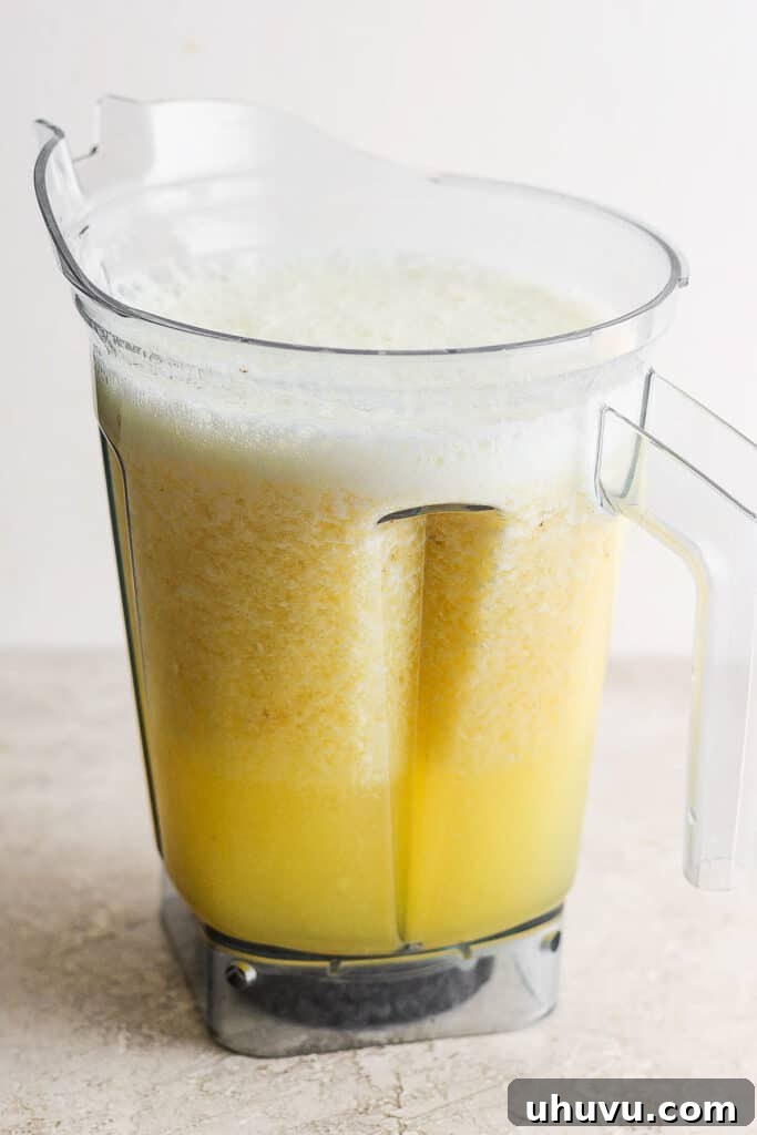 Tropical Pineapple Quencher 5 Blended agua de pina in a blender.