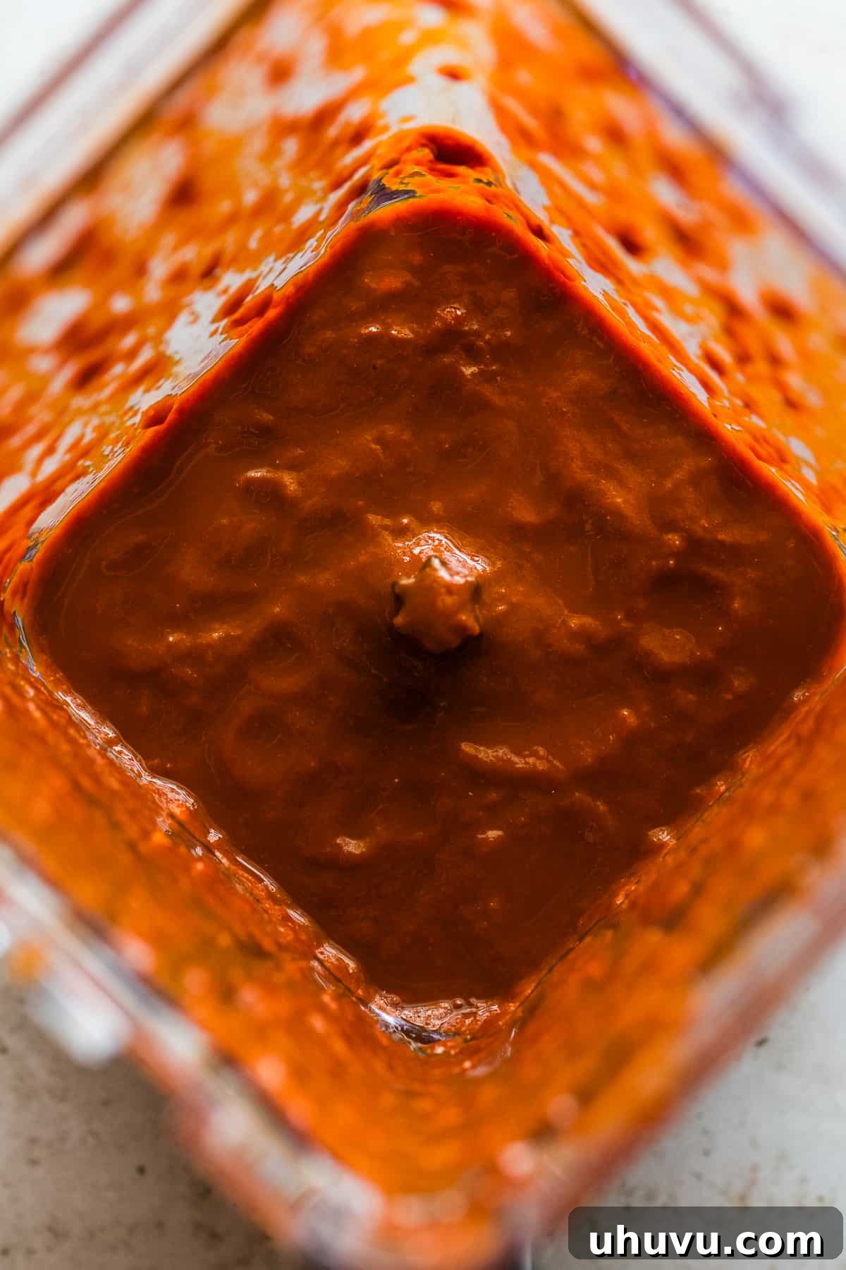 Spicy Nopal Quesadillas 7 A vibrant, smooth red chile sauce after blending, ready to be cooked with nopales.