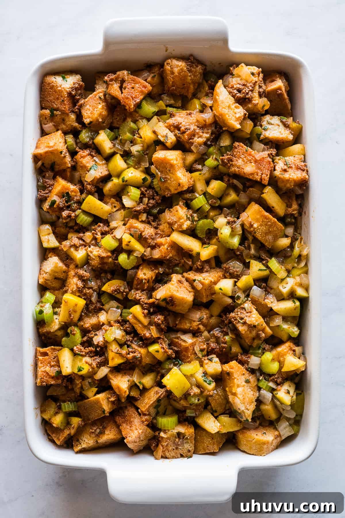 Spicy Chorizo Stuffing 9 A piping hot baking dish of golden-brown chorizo stuffing, fresh out of the oven, with a crispy top crust.
