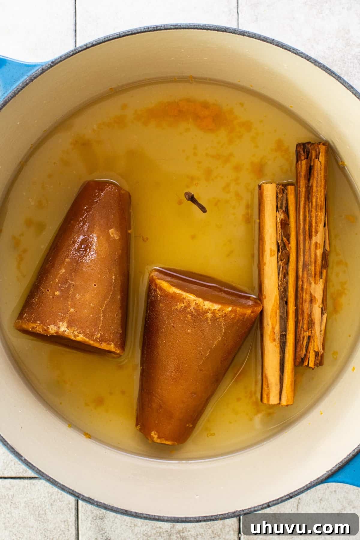 Mexican Candied Pumpkin 4 Piloncillo, clove, ceylon cinnamon, and orang zest in a pot.