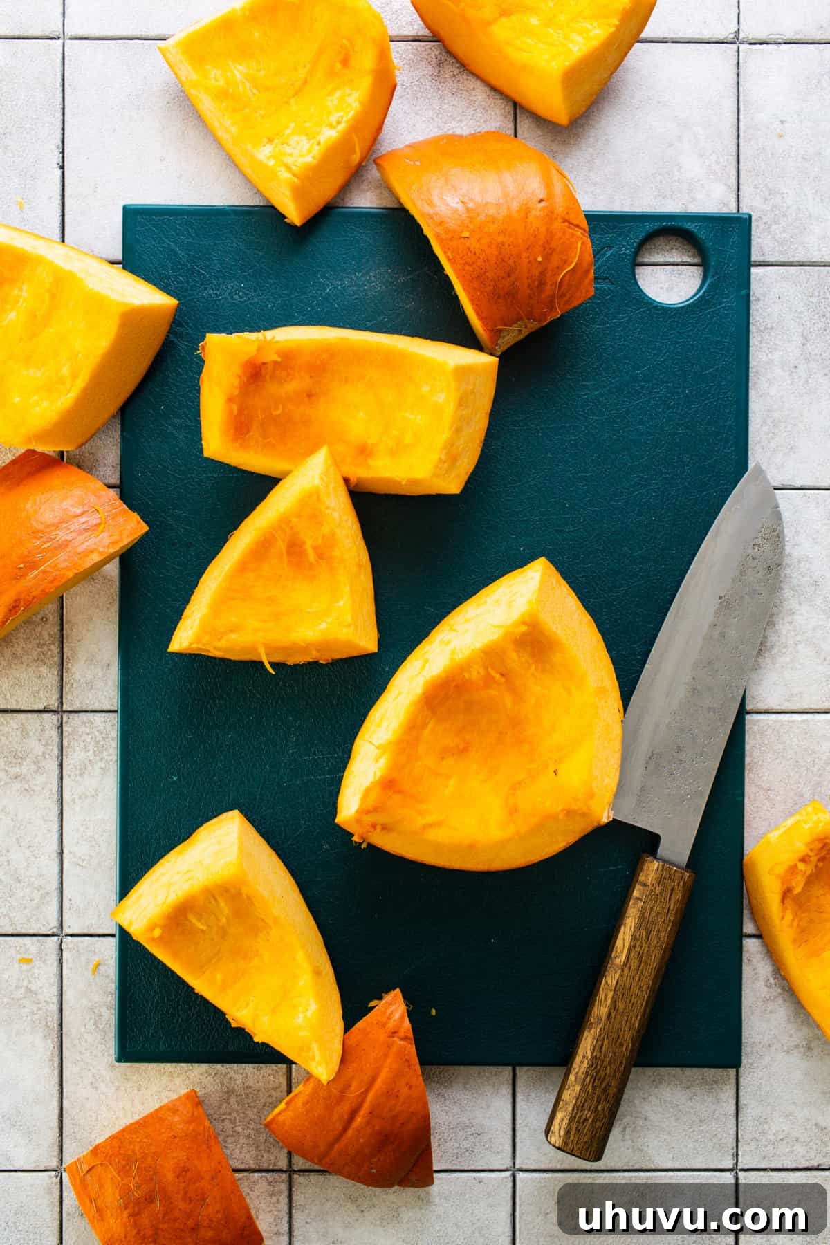 Mexican Candied Pumpkin 5 Sliced pumpkin on a cutting board.