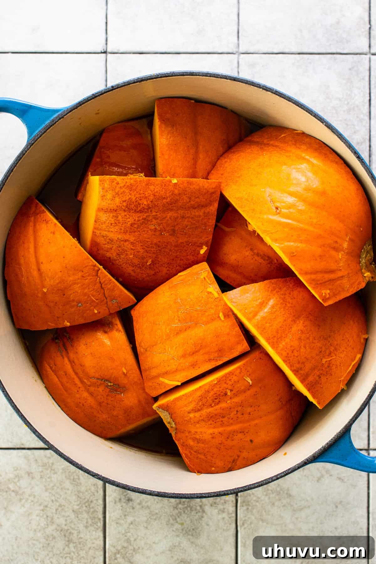Mexican Candied Pumpkin 6 Cut pumpkin slices layer skin side up in a pot to make calabaza en tacha.