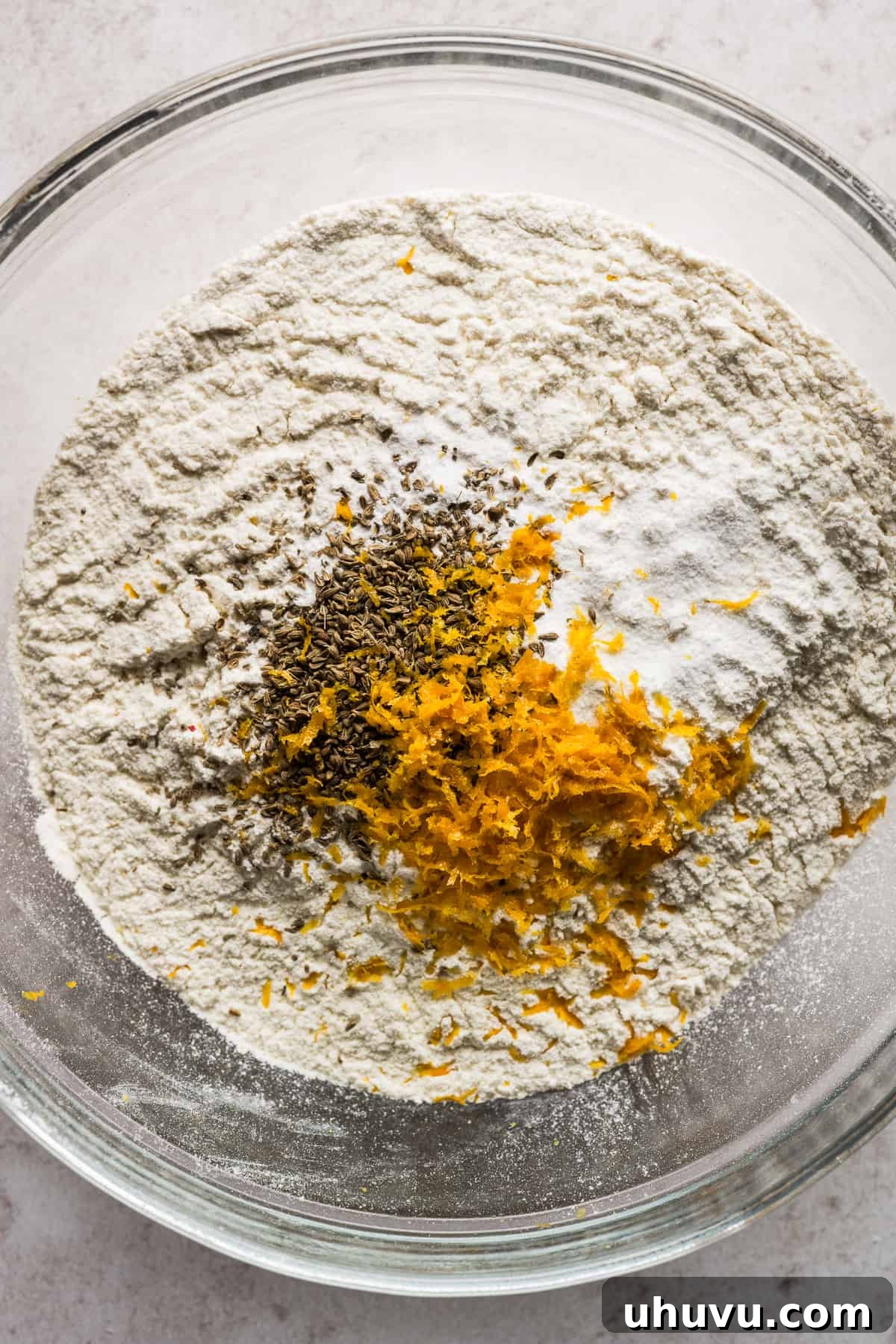 The dry ingredients for biscochito dough in a large bowl before being mixed together.