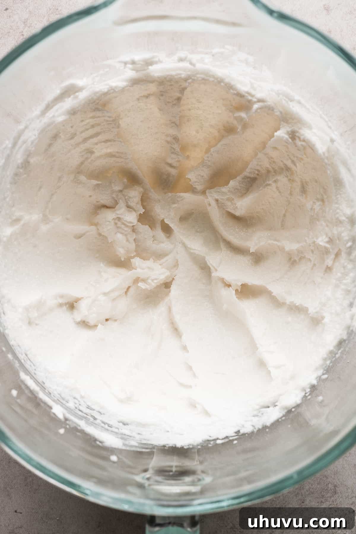 Whipped and creamed lard and sugar in a large bowl.
