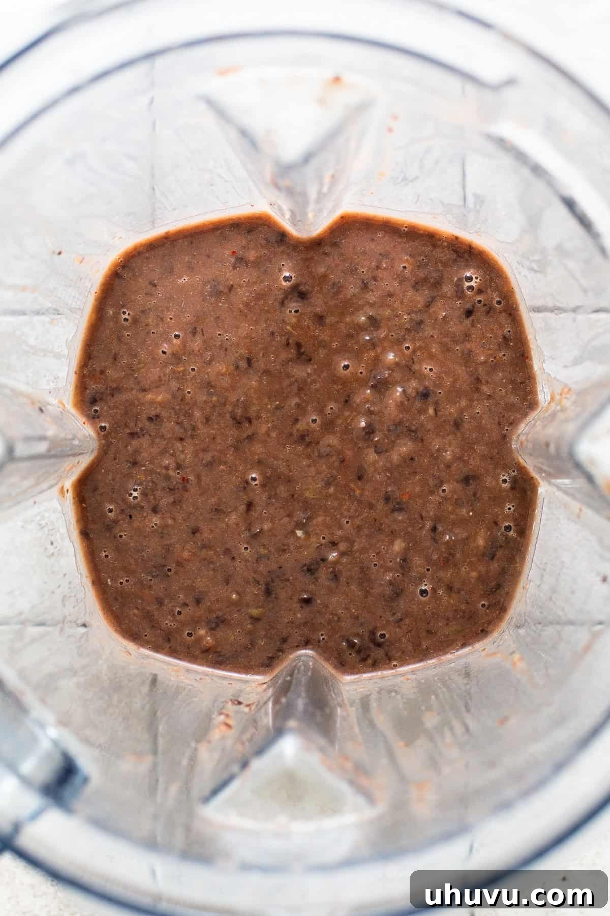 Black bean soup blended until smooth in a blender.