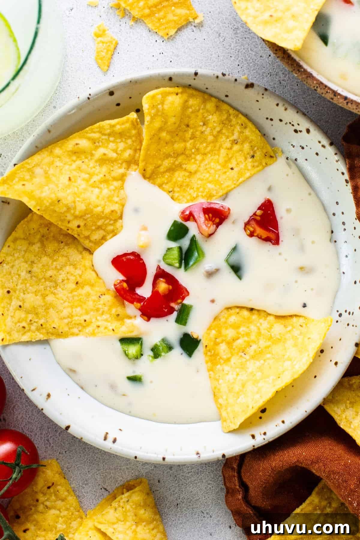 February 2024 Culinary Cook-Off 3 A delicious bowl of creamy queso blanco dip with tortilla chips, inviting participants to try this month's recipe.