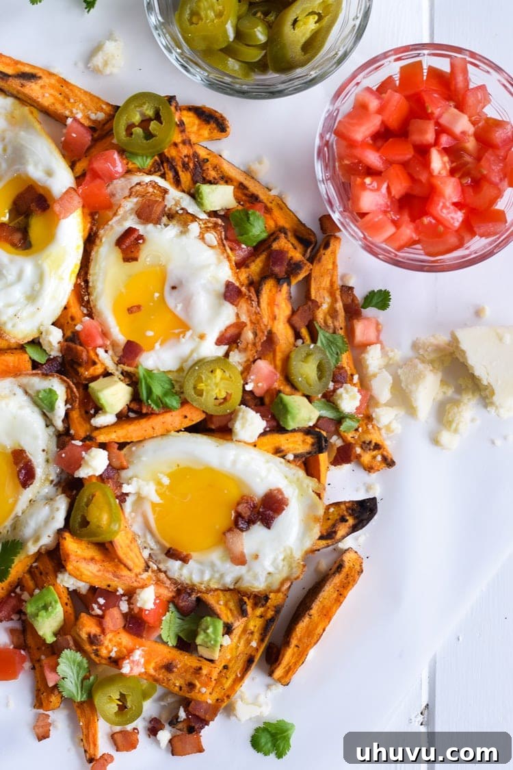 Sunrise Sweet Potato Stacks 4 Loaded Sweet Potato Breakfast Fries with various fresh toppings and runny egg