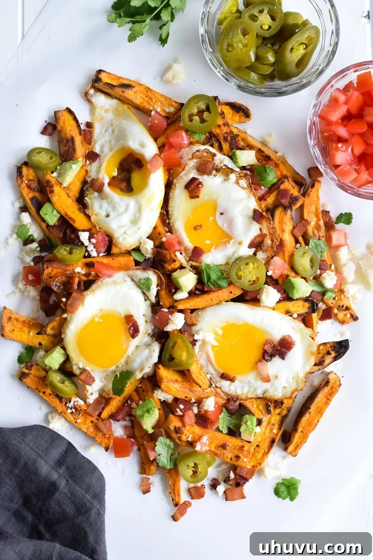 Sunrise Sweet Potato Stacks 5 Overhead shot of fully loaded sweet potato breakfast fries ready to eat