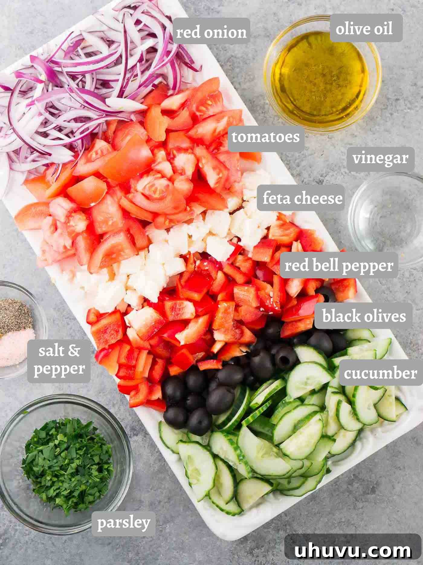 Collection of fresh ingredients for a Greek salad recipe