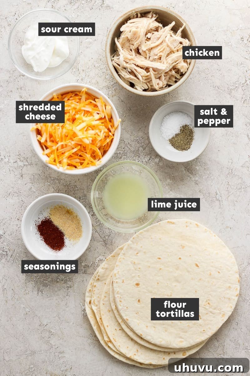 Crispy Air Fryer Chicken Quesadillas 3 A vibrant selection of ingredients for air fryer chicken quesadillas, including shredded chicken, cheese, tortillas, and chili-lime sauce components.
