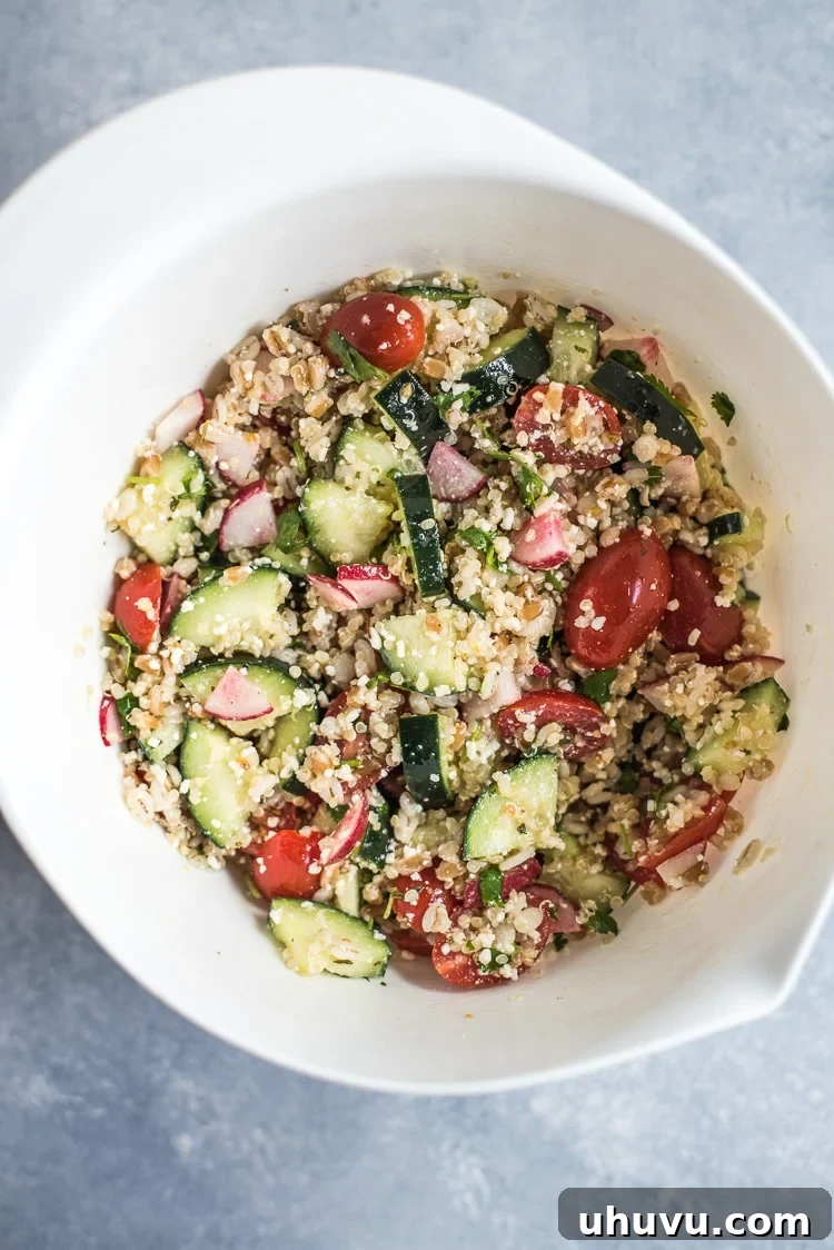 A vibrant bowl of Mexican Quinoa Salad, showcasing the colorful ingredients.