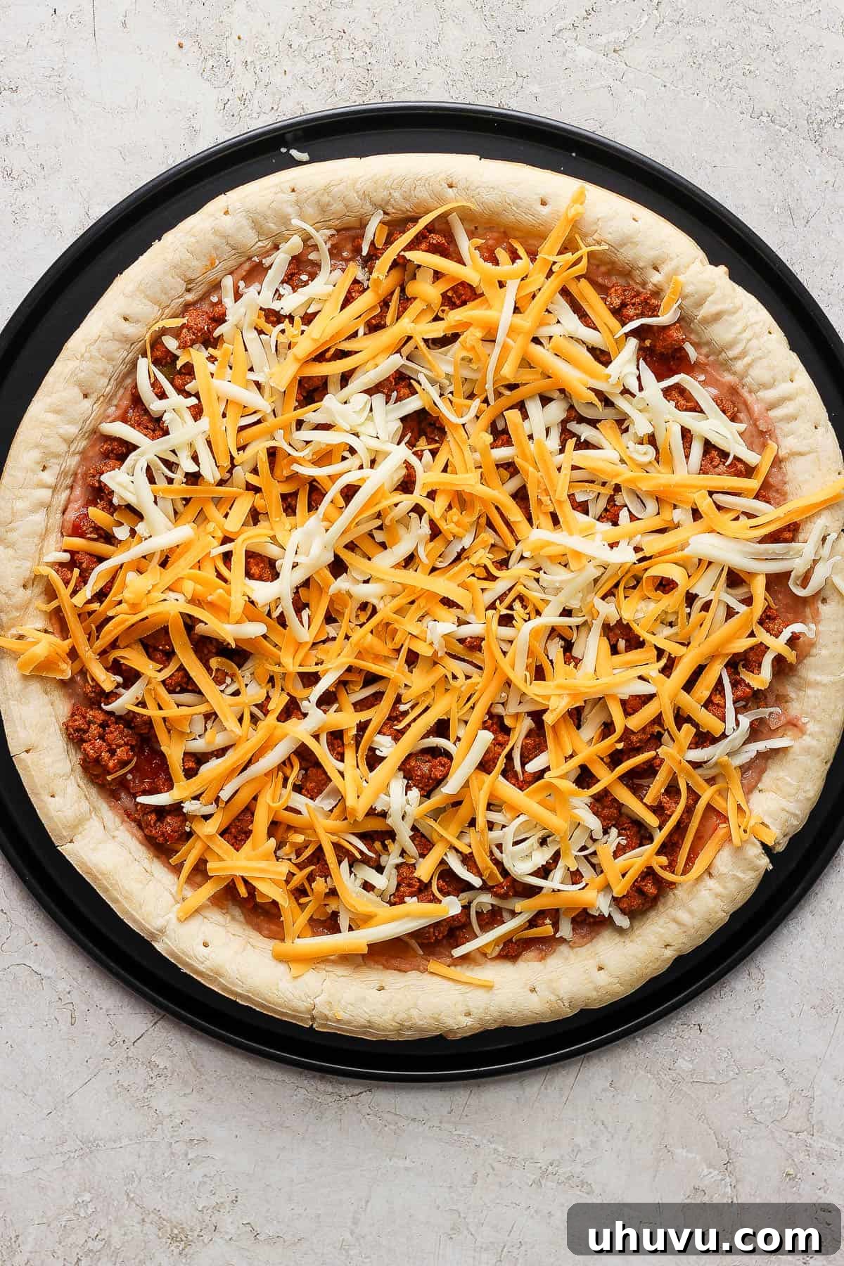 Zesty Mexican Pizza 8 Ground beef and cheese added to the taco pizza.