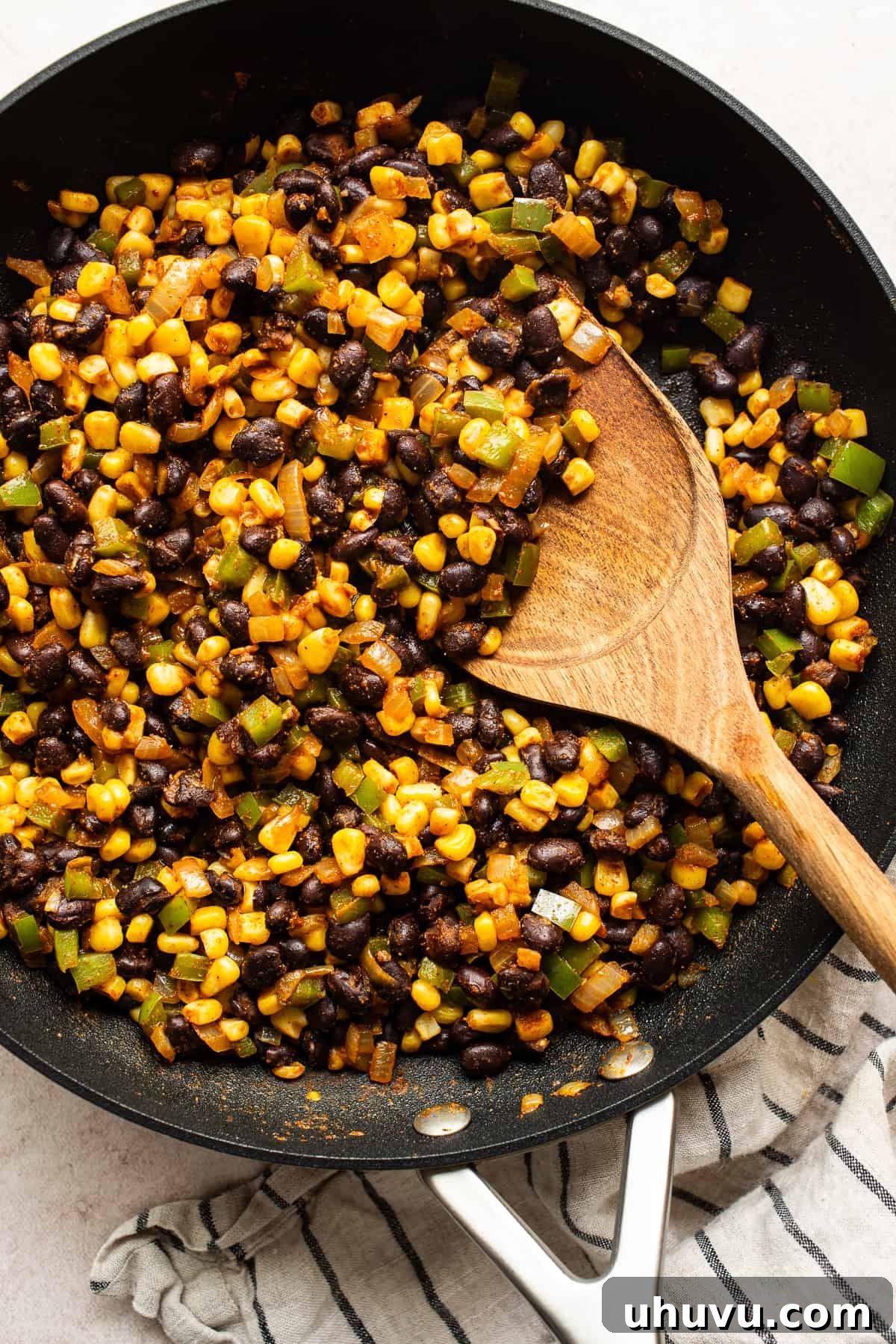 Fiesta Black Bean Melts 5 Black bean and corn filling for quesadillas in a skillet.