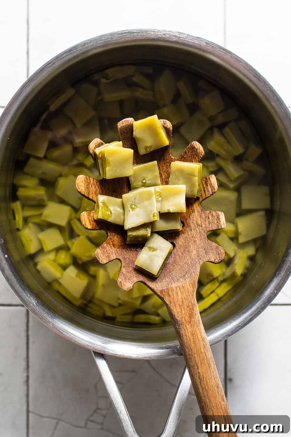 Fresh Nopal Fiesta 4 Diced nopales cactus paddles boiling in a pot of salted water.