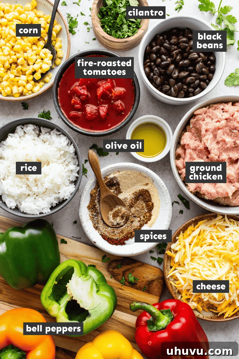 Fiesta Stuffed Peppers 3 All the fresh ingredients for Mexican stuffed peppers neatly arranged in separate bowls on a kitchen counter.
