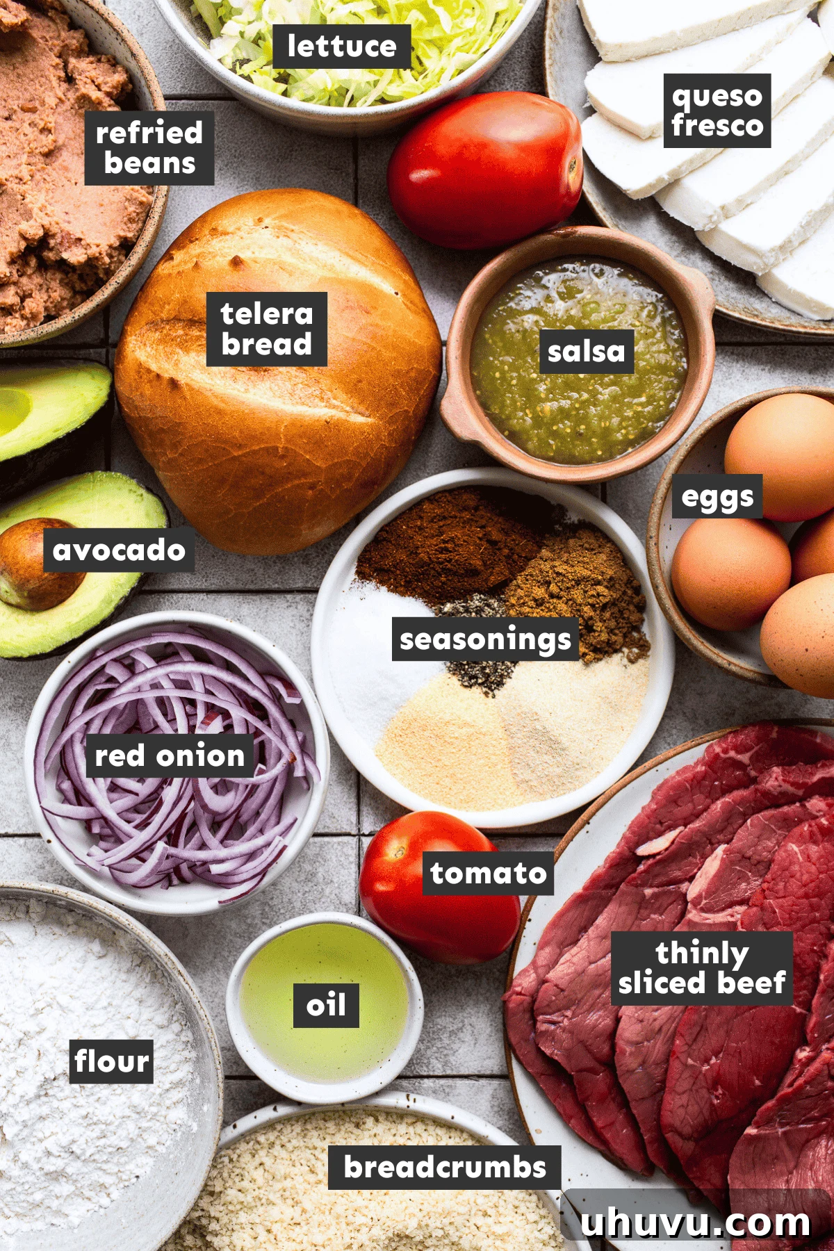 Ingredients laid out on a table for making Torta de Milanesa.