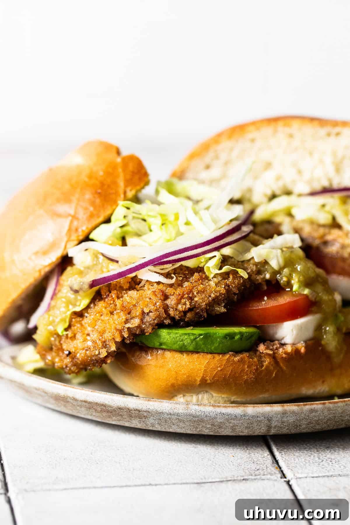 A delicious Torta de Milanesa served on a plate, ready to be enjoyed.