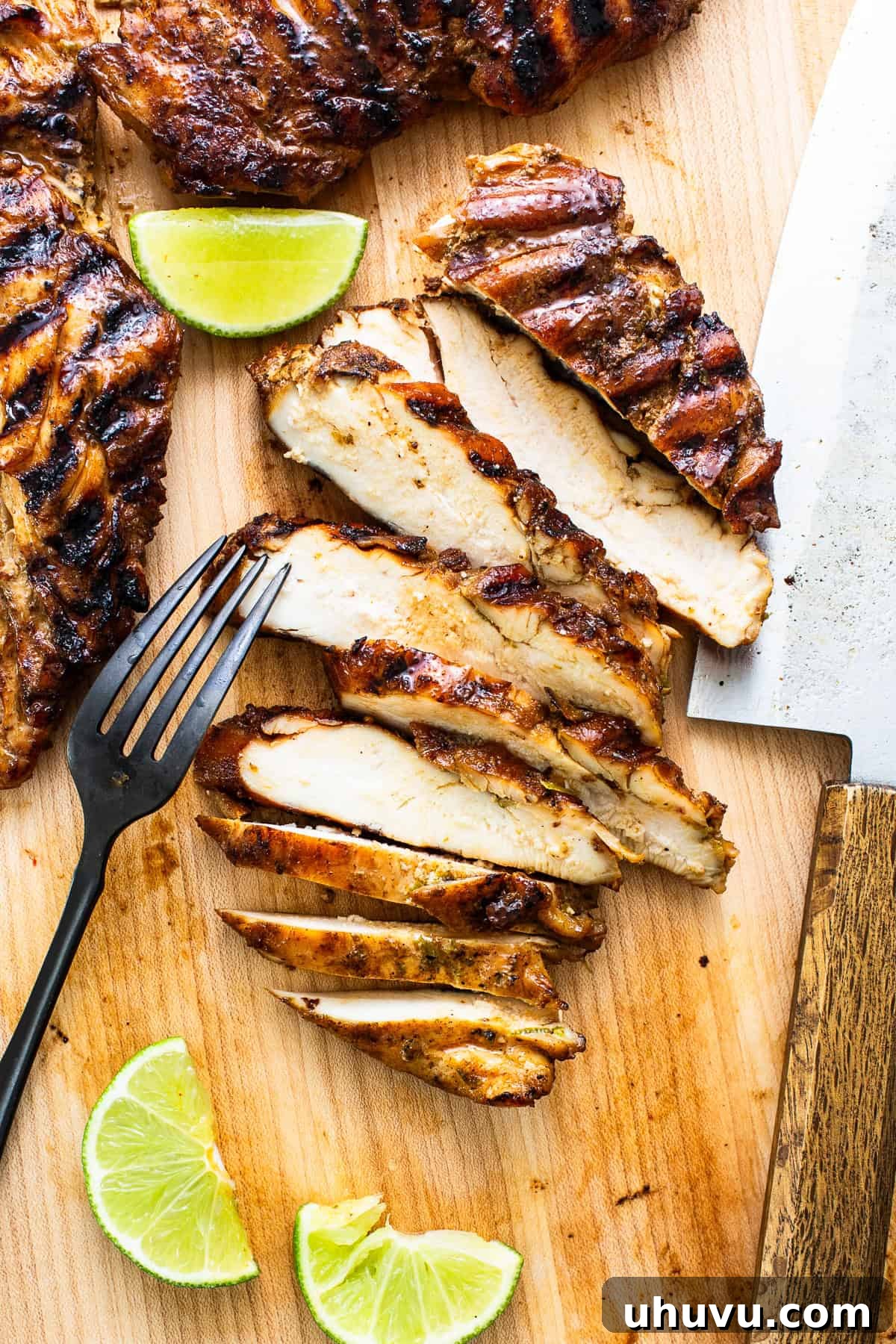 Zesty Tequila Lime Chicken 7 Grilled chicken cut into slices on a cutting board
