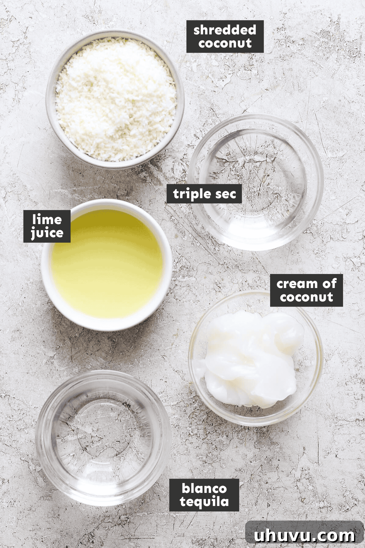 Tropical Coconut Margarita 3 Coconut margarita ingredients laid out in bowls