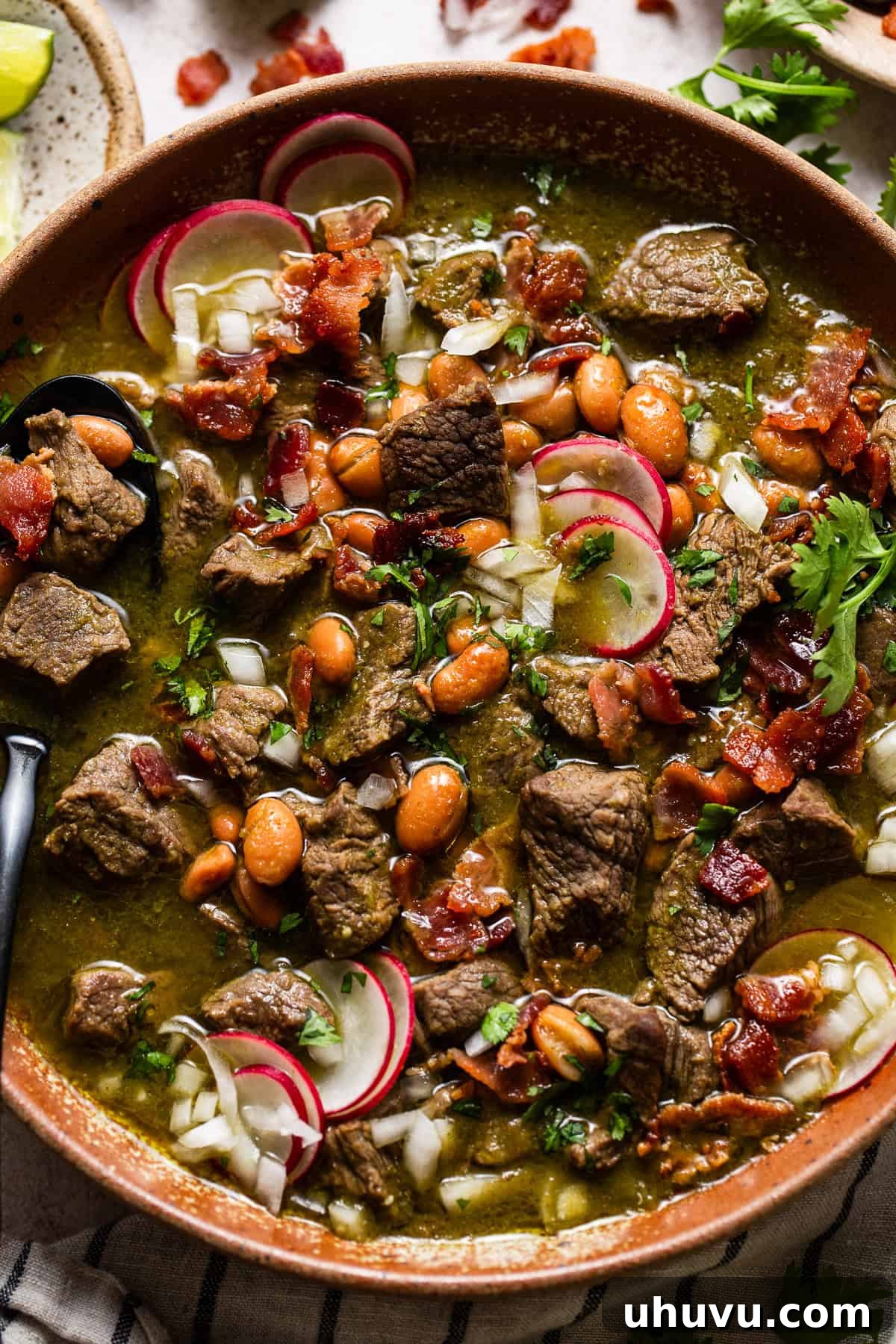 Rich Beef Broth 2 Carne en su jugo served in a bowl with toppings.