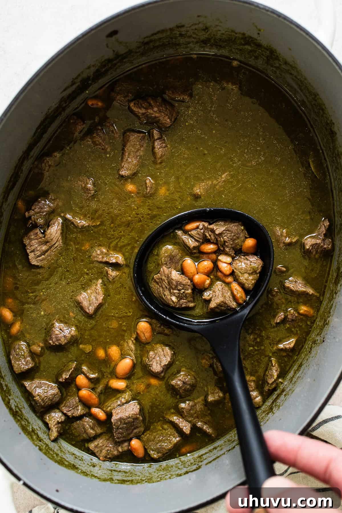 Rich Beef Broth 7 Stirring in the pinto beans to cook longer.