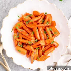 Golden Nectar Carrots 10 honey glazed carrots served in a white bowl