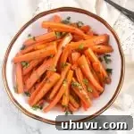 Roasted Honey Glazed Carrots #sides #carrots #thanksgiving #holiday #paleo oven Roasted Carrots served in a serving bowl