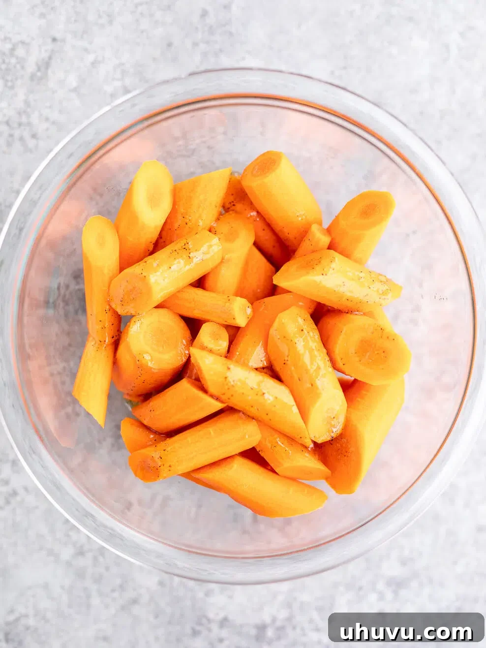 Golden Nectar Carrots 6 coated carrots with glaze in a glass bowl