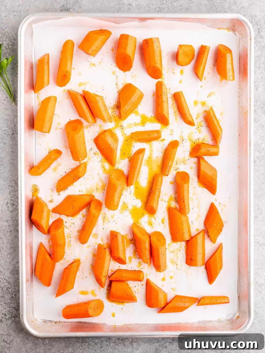 Golden Nectar Carrots 7 honey glazed carrots on a baking sheet
