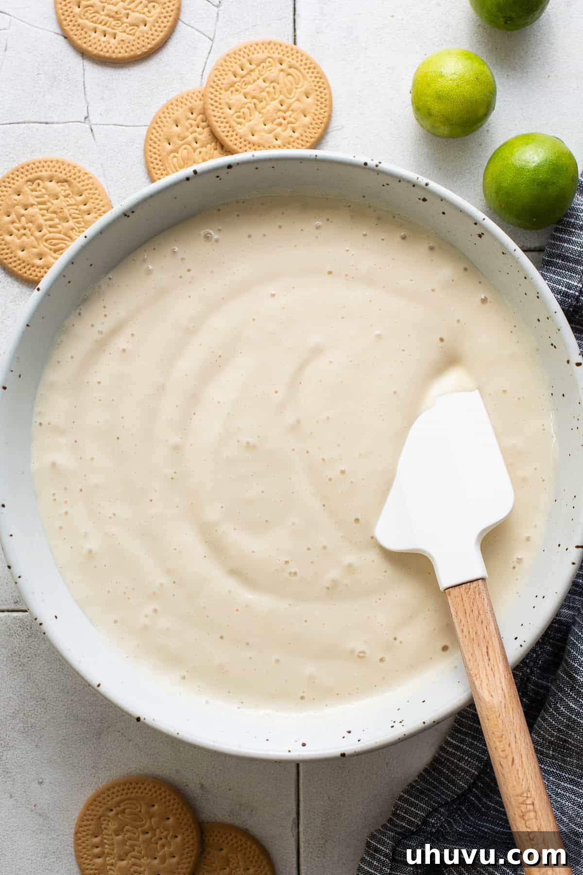All wet ingredients for the key lime mixture are blended smoothly in a blender.
