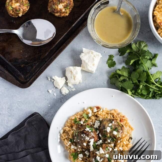 These Mexican Turkey Meatballs made with cilantro, garlic and a packet of taco seasoning are a great appetizer or weeknight meal when served with Arroz Verde.