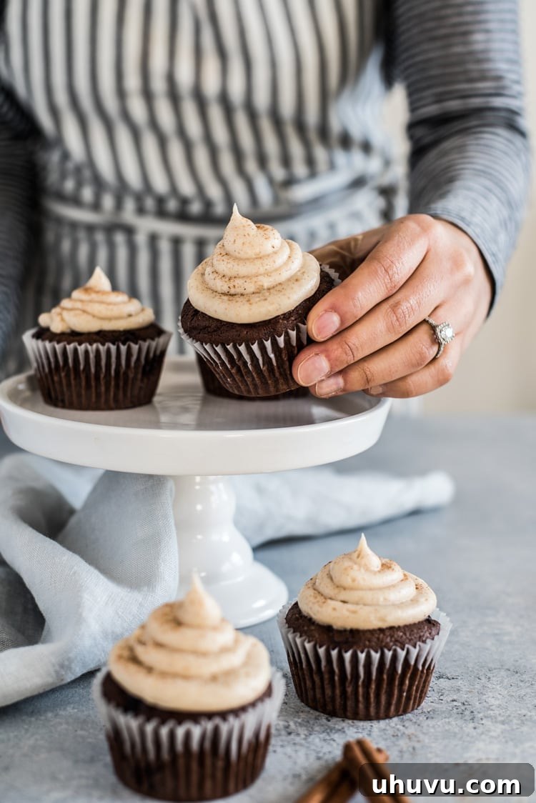 Decadent Cherry Chocolate Cupcakes with Spiced Cream Cheese Frosting 5 Homemade Cinnamon Cream Cheese Frosting on Cherry Chocolate Cupcakes