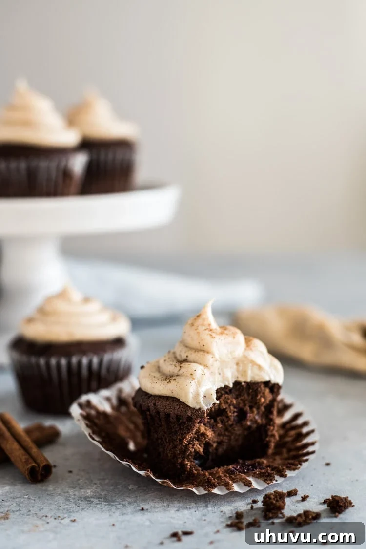 Decadent Cherry Chocolate Cupcakes with Spiced Cream Cheese Frosting 6 Decorated Cherry Chocolate Cupcakes with Cinnamon Cream Cheese Frosting